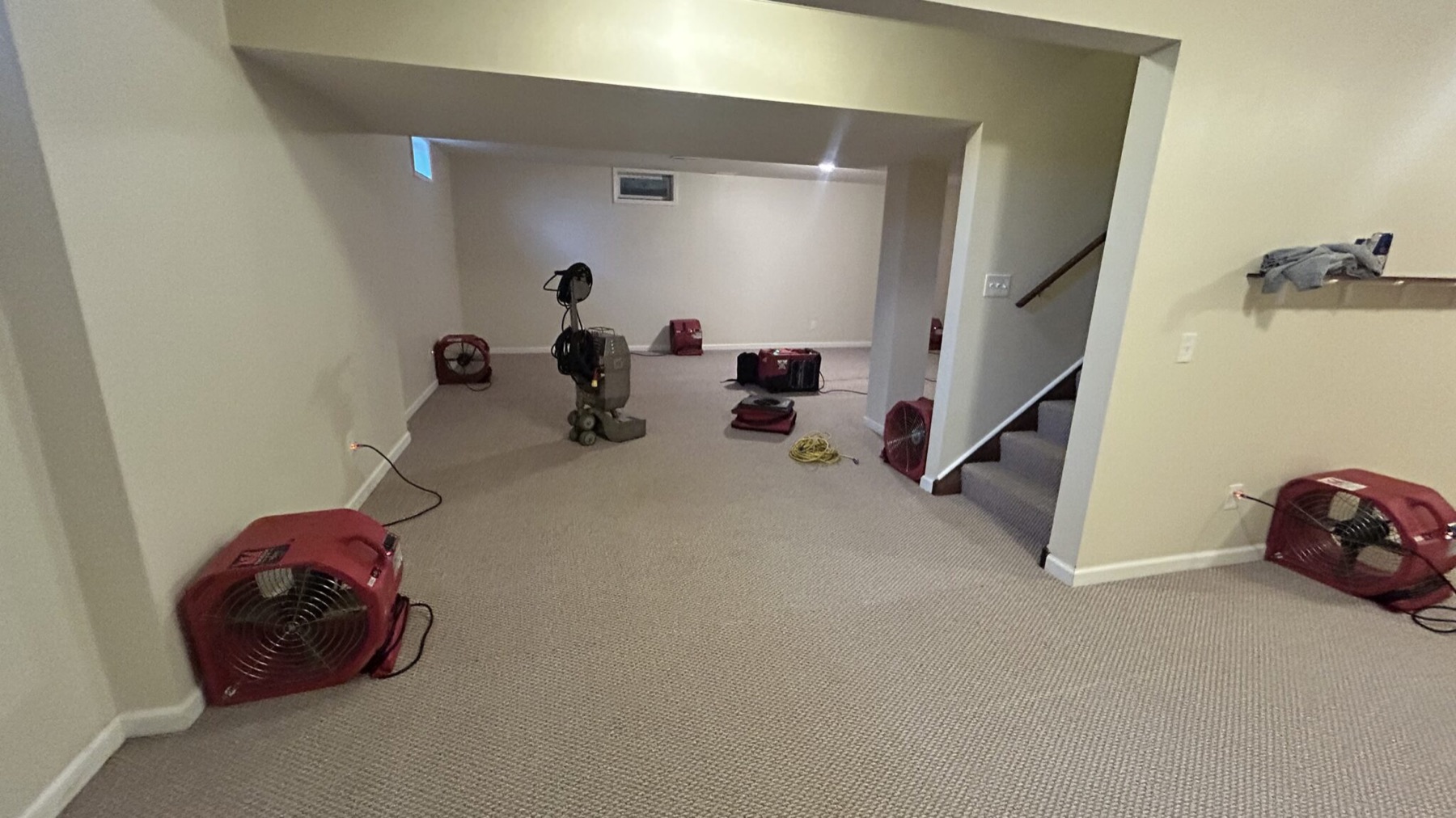 Air movers in a residential basement